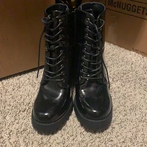 Black leather high heel boots